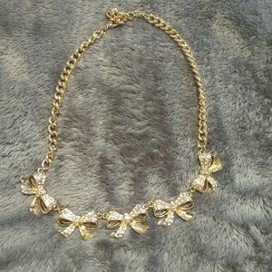 gold ribbon necklace